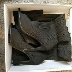 High heel boots never worn comes with orginal box.